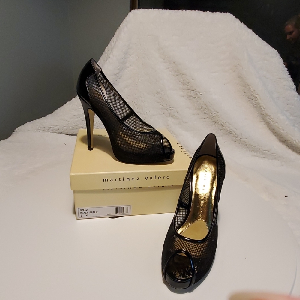 Martinez Valero Patent Leather
peep toe pump